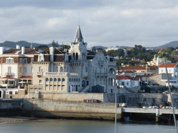 The Capitania Porto Cascais building at the Cascais harbour, viewed from the Passeio Dona Maria Pia walkway