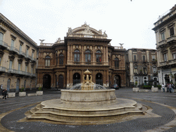 The Teatro Bellini theatre and the fountain at the Piazza Vincenzo Bellini square