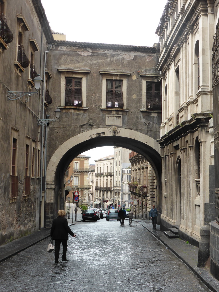 The Arco di San Benedetto arch over the Via dei Crociferi street