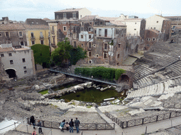 The cavea and orchestra of the Greek-Roman Theatre, viewed from the Casa Liberti house