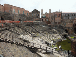 The cavea of the Greek-Roman Theatre, and the towers of the Chiesa di San Francesco e l`Immacolata church