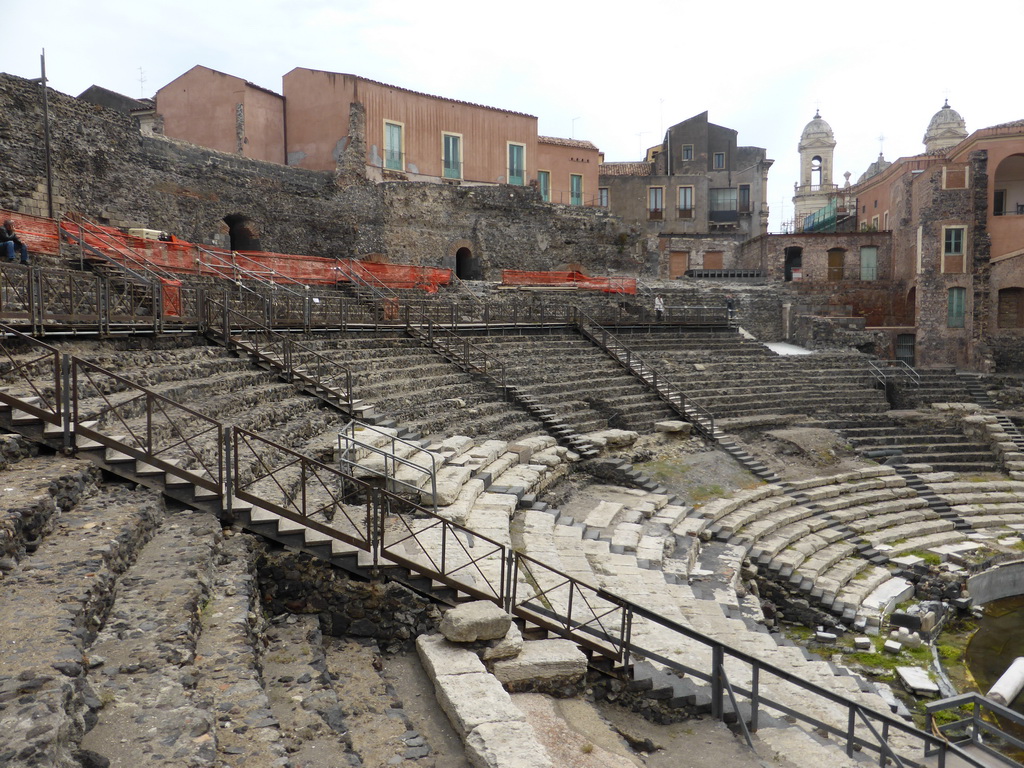 The cavea of the Greek-Roman Theatre, and the towers of the Chiesa di San Francesco e l`Immacolata church