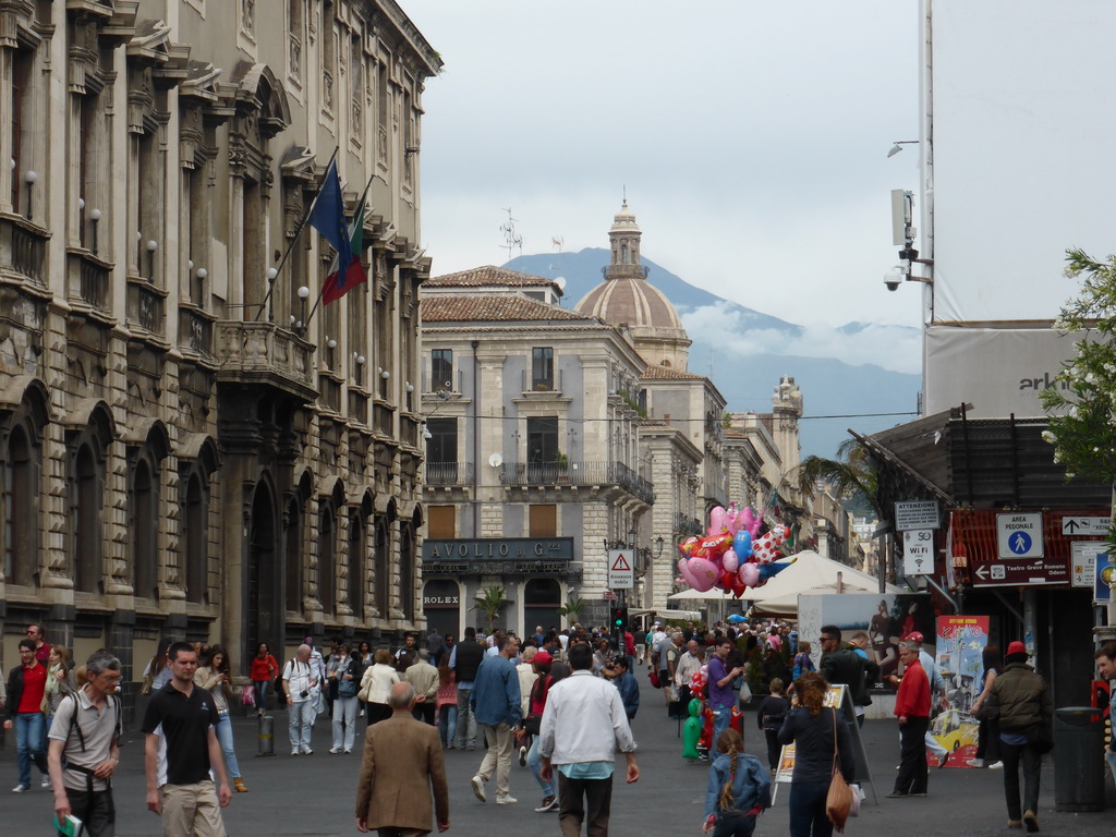 The Via Etnea street, the Piazza Università square, the dome of the Chiesa dei Minoriti church and Mount Etna