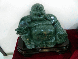 Jade Laughing Buddha statue in the jade workshop at Jingyin Road