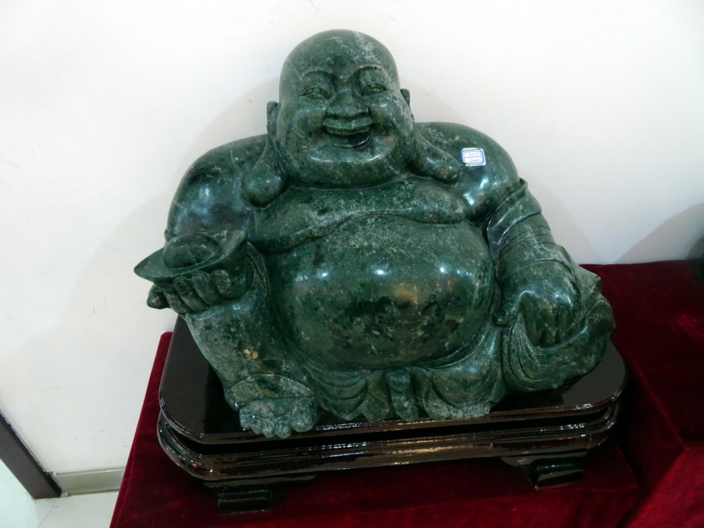 Jade Laughing Buddha statue in the jade workshop at Jingyin Road