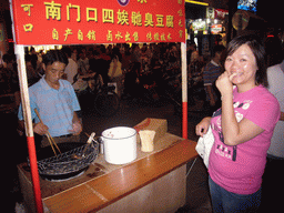 Miaomiao at food stall in Walking Street, by night