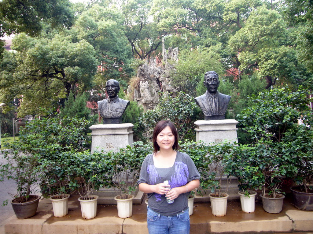 Miaomiao with two busts at the old buildings of Central South University