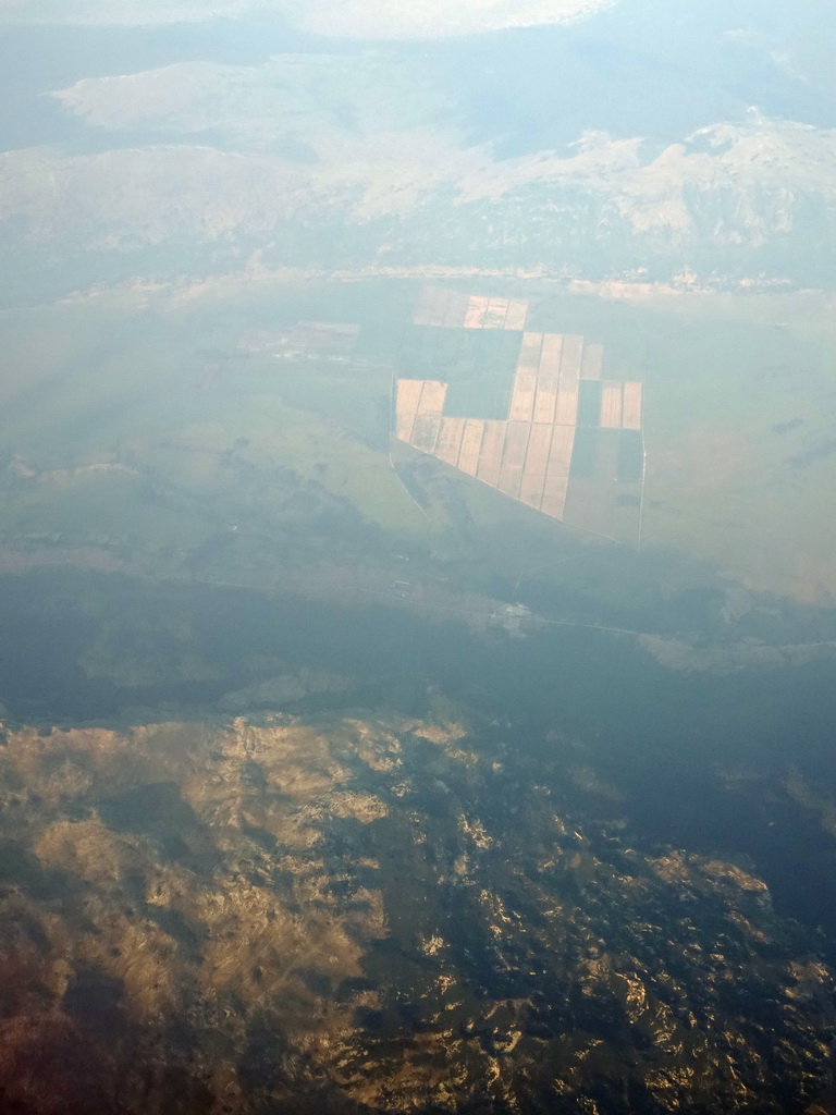 The Veliki Bat mountain and fields in Bosnia and Herzegovina, viewed from the airplane from Rotterdam