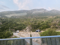 Road and hills near the town of Cavtat, viewed from the bus from Dubrovnik Airport to the Grand Hotel Park on the D8 road
