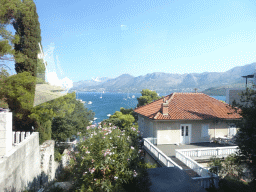 Houses at the Put Tihe street at Cavtat, viewed from the tour bus to Perast