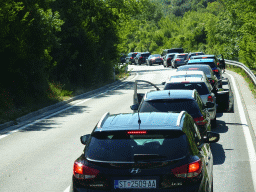 Cars waiting in line for the Croatia-Montenegro border crossing near the town of Plocice, viewed from the tour bus to Perast on the D8 road