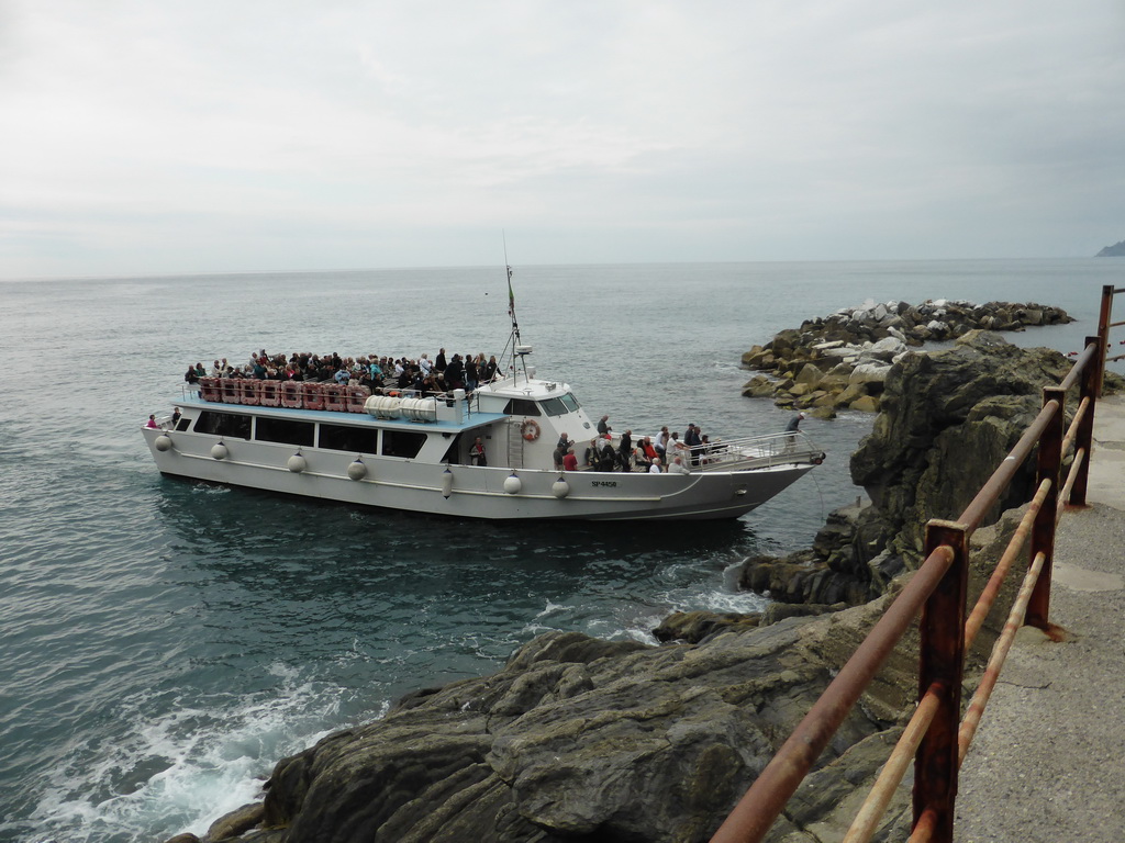 Ferry arriving at the pier of Riomaggiore