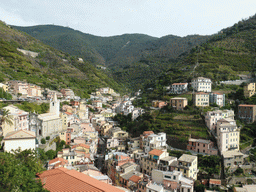 The upper side of the town with the Via Colombo street and the Chiesa di San Giovanni Battista church, viewed from the Riomaggiore Castle