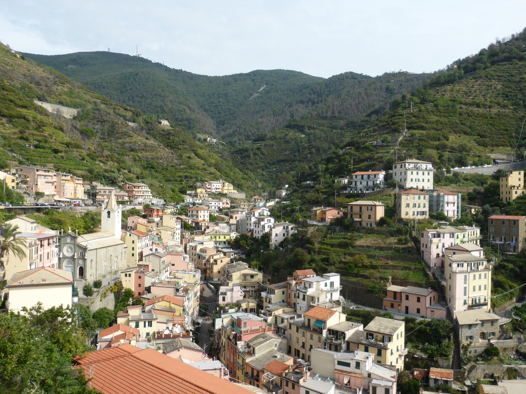 The upper side of the town with the Via Colombo street and the Chiesa di San Giovanni Battista church, viewed from the Riomaggiore Castle
