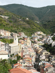 The upper side of the town with the Via Colombo street and the Chiesa di San Giovanni Battista church, viewed from the Riomaggiore Castle