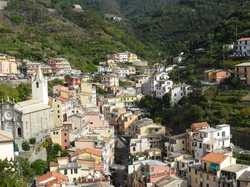 The upper side of the town with the Via Colombo street and the Chiesa di San Giovanni Battista church, viewed from the Riomaggiore Castle