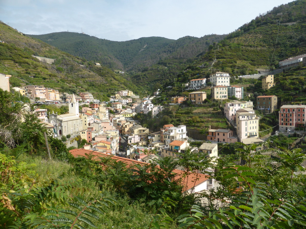 The upper side of the town with the Via Colombo street and the Chiesa di San Giovanni Battista church, viewed from the Riomaggiore Castle