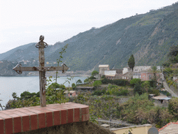 Cross at the Via Belvedere street at Manarola with a view on the Punta Bonfiglio hill and the Via dei Giovani path to Corniglia