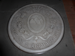 Municipal logo of Riomaggiore in the Piazza Dario Capellini square at Manarola, by night