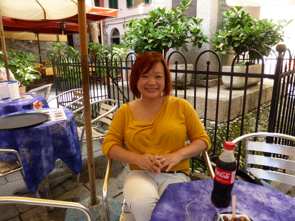 Miaomiao at the terrace of the Caffe Matteo restaurant at the Largo Taragio square at Corniglia