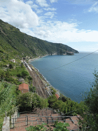 The Scalinata Lardarina staircase with a view on the Corniglia railway station and Manarola