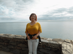 Miaomiao at the Doria Castle at Vernazza, with a view on the Ligurian Sea