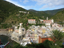 The town of Vernazza with the Chiesa di Santa Margherita d`Antiochia church and the Santuario di Nostra Signora di Reggio sanctuary, viewed from the Doria Castle