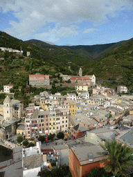 The town of Vernazza with the Chiesa di Santa Margherita d`Antiochia church and the Santuario di Nostra Signora di Reggio sanctuary, viewed from the tower of the Doria Castle