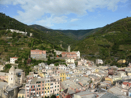 The town of Vernazza with the Chiesa di Santa Margherita d`Antiochia church and the Santuario di Nostra Signora di Reggio sanctuary, viewed from the tower of the Doria Castle