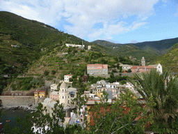 The town of Vernazza with the Chiesa di Santa Margherita d`Antiochia church and the Santuario di Nostra Signora di Reggio sanctuary, viewed from the Doria Castle