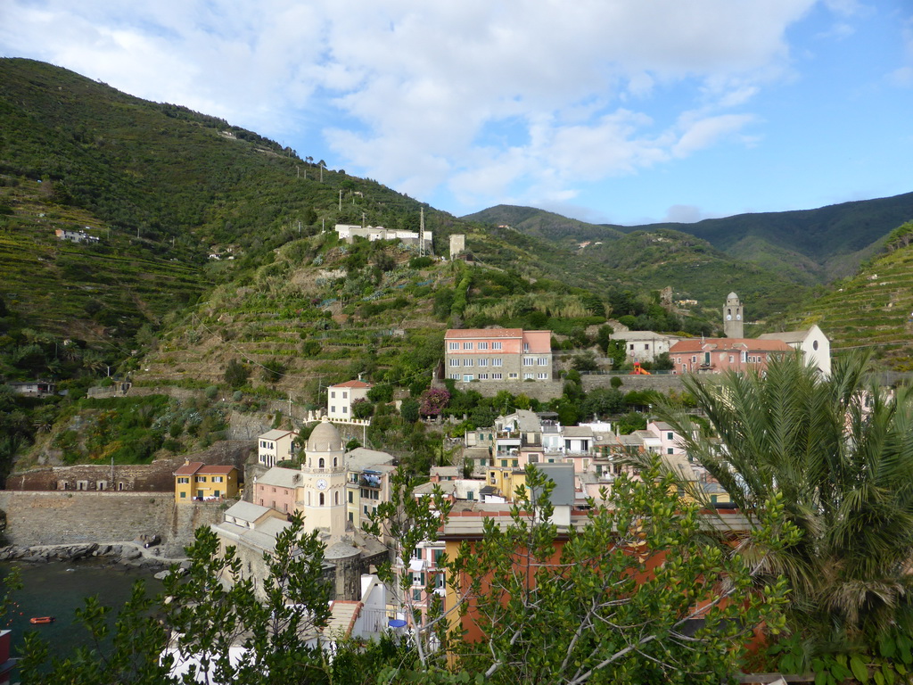 The town of Vernazza with the Chiesa di Santa Margherita d`Antiochia church and the Santuario di Nostra Signora di Reggio sanctuary, viewed from the Doria Castle