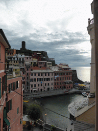 The harbour of Vernazza, the Chiesa di Santa Margherita d`Antiochia church and the Doria Castle, viewed from the path to Monterosso al Mare