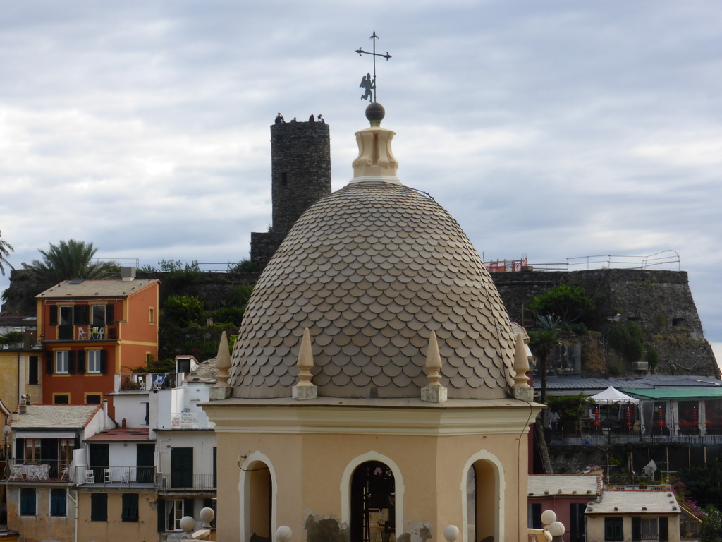 The tower of the Chiesa di Santa Margherita d`Antiochia church and the Doria Castle at Vernazza, viewed from the path to Monterosso al Mare