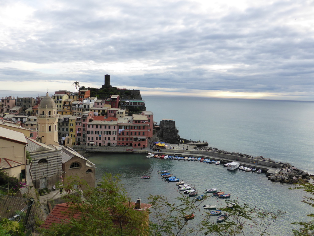 The harbour of Vernazza, the Chiesa di Santa Margherita d`Antiochia church and the Doria Castle, viewed from the path to Monterosso al Mare