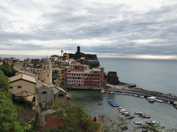 The harbour of Vernazza, the Chiesa di Santa Margherita d`Antiochia church and the Doria Castle, viewed from the path to Monterosso al Mare