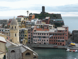 The harbour of Vernazza, the Chiesa di Santa Margherita d`Antiochia church and the Doria Castle, viewed from the path to Monterosso al Mare