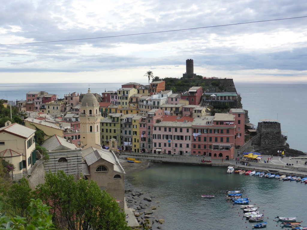 The harbour of Vernazza, the Chiesa di Santa Margherita d`Antiochia church and the Doria Castle, viewed from the path to Monterosso al Mare