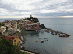 The harbour of Vernazza, the Chiesa di Santa Margherita d`Antiochia church and the Doria Castle, viewed from the path to Monterosso al Mare