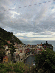 The town of Vernazza with its harbour, the Chiesa di Santa Margherita d`Antiochia church and the Doria Castle, viewed from the path to Monterosso al Mare