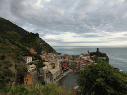 The town of Vernazza with its harbour, the Chiesa di Santa Margherita d`Antiochia church and the Doria Castle, viewed from the path to Monterosso al Mare