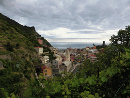 The town of Vernazza with the Chiesa di Santa Margherita d`Antiochia church and the Doria Castle, viewed from the path to Monterosso al Mare