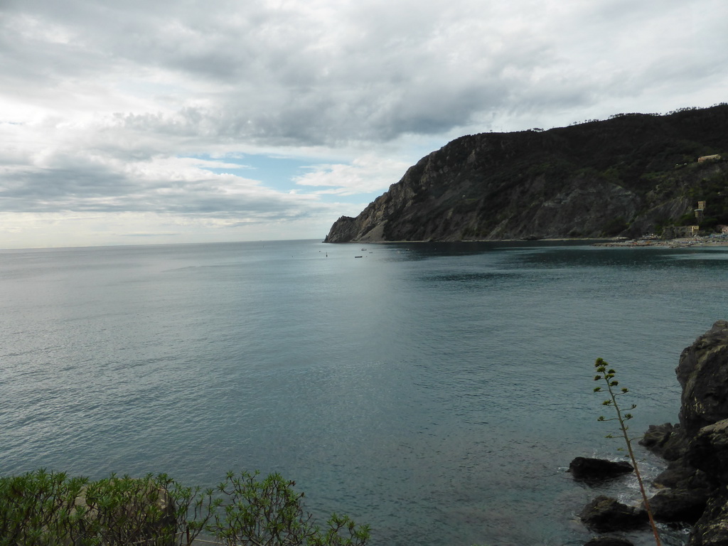 The Punta Mesco hill and the beach of the new town of Monterosso al Mare, viewed from the window near the Torre Aurora tower