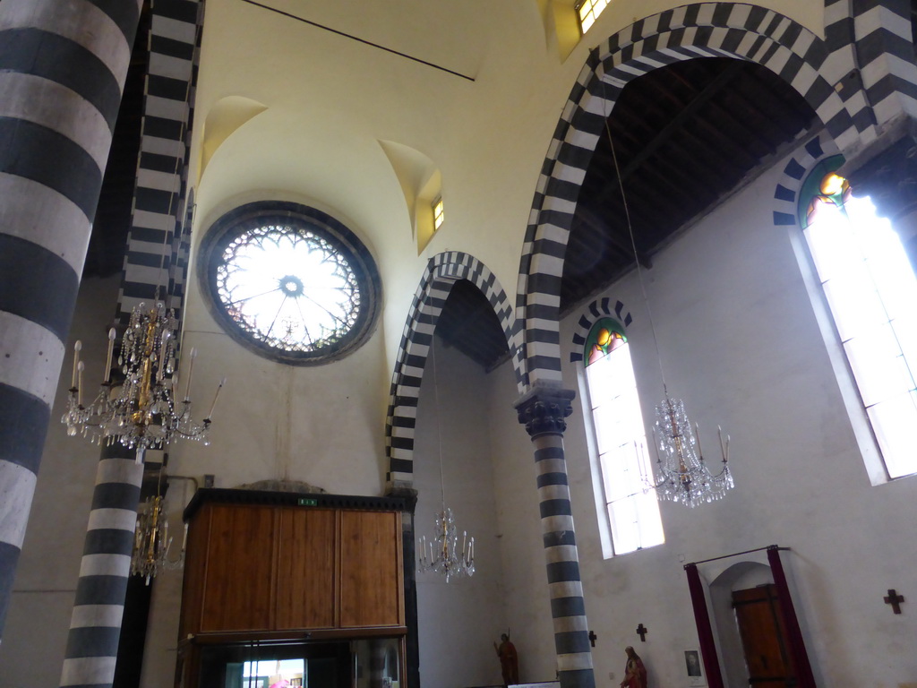 Stained glass windows and the nave of the Chiesa di San Giovanni Battista church at Monterosso al Mare