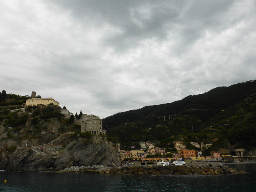 Monterosso al Mare with its harbour and the Torre Aurora tower, viewed from the ferry to Vernazza