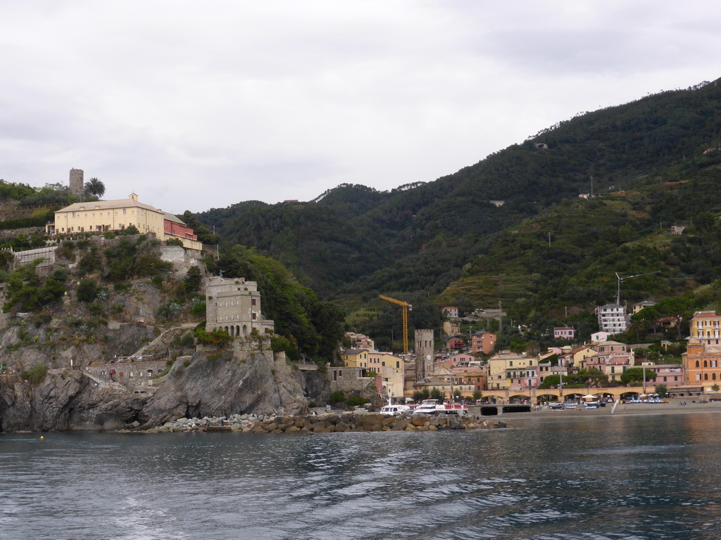 Monterosso al Mare with its harbour and beach and the Torre Aurora tower, viewed from the ferry to Vernazza