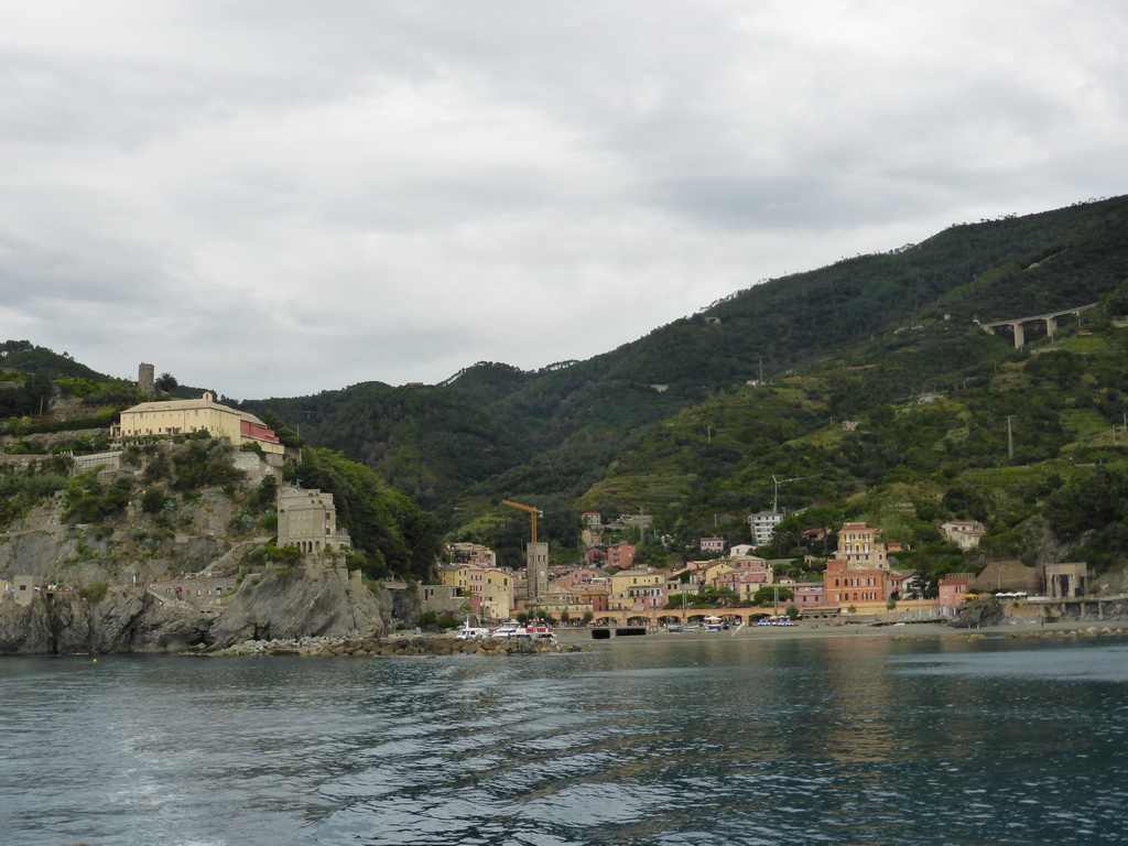 Monterosso al Mare with its harbour and beach and the Torre Aurora tower, viewed from the ferry to Vernazza