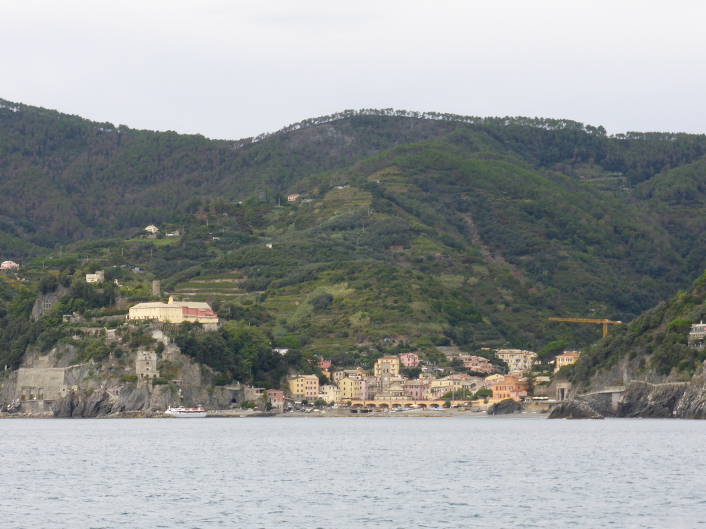 Monterosso al Mare with its harbour and beach and the Torre Aurora tower, viewed from the ferry to Vernazza
