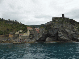The harbour of Vernazza, the Chiesa di Santa Margherita d`Antiochia church and the Doria Castle, viewed from the ferry to Manarola