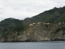 Corniglia and the Santuario di San Bernardino sanctuary, viewed from the ferry from Vernazza to Manarola