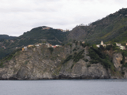 Corniglia and the Santuario di San Bernardino sanctuary, viewed from the ferry from Vernazza to Manarola